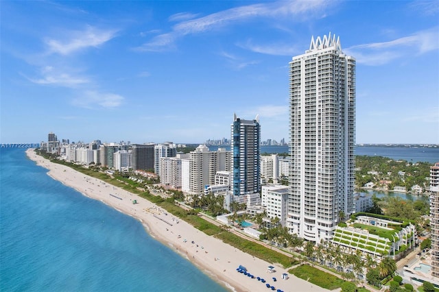 bird's eye view with a beach view, a city view, and a water view