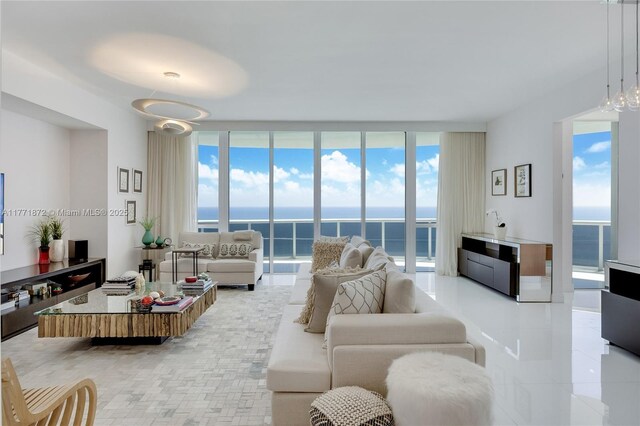 15811 Collins Ave Unit 2101, Sunny Isles Beach, FL 33160 - living area with a wall of windows and a water view