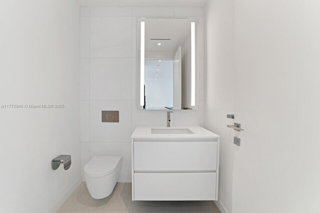 300 Biscayne Blvd Way Unit 4206W, Miami, FL 33131 - bathroom featuring toilet, vanity, and baseboards