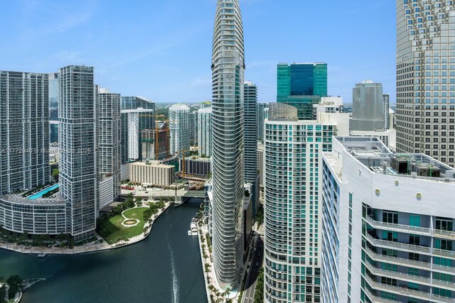 300 Biscayne Blvd Way Unit 4206W, Miami, FL 33131 - gym with expansive windows, light wood-type flooring, and a water view