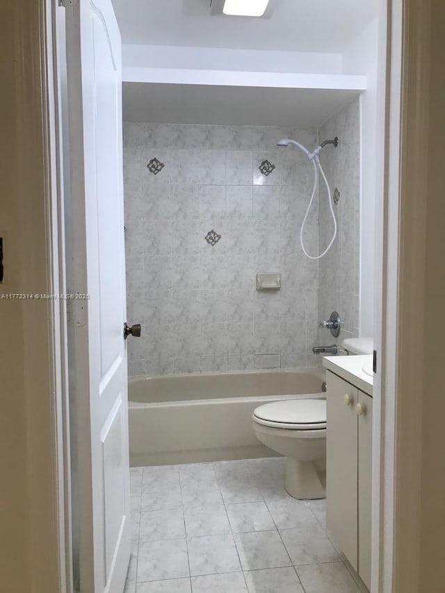 bathroom with toilet, washtub / shower combination, and vanity