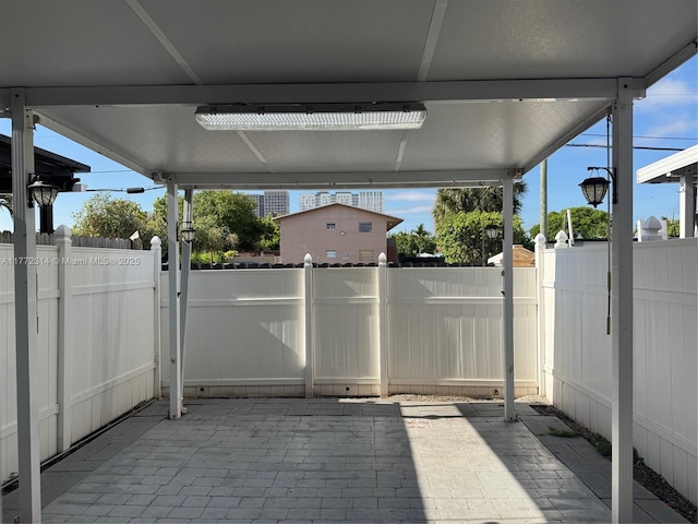 130 SW 109th Ave Unit 7, Sweetwater, FL 33174 - unfurnished sunroom featuring healthy amount of natural light