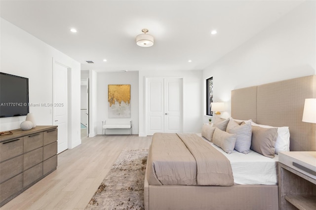 7285 SW 72nd Ter, Miami, FL 33143 - bedroom with light wood finished floors, recessed lighting, and a closet