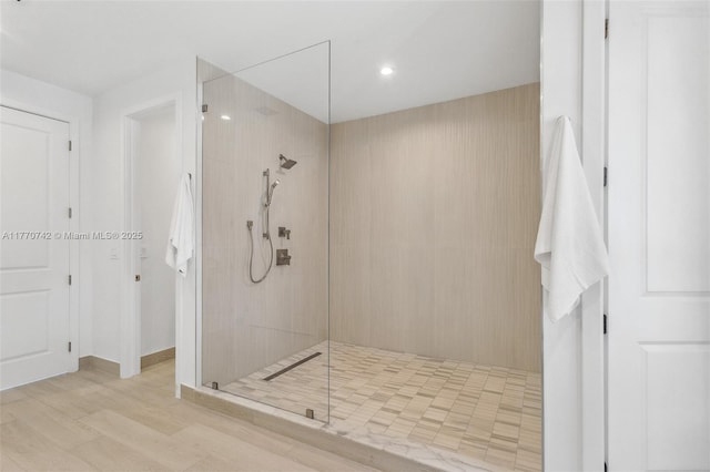 7285 SW 72nd Ter, Miami, FL 33143 - full bath with a tile shower, recessed lighting, and wood finished floors