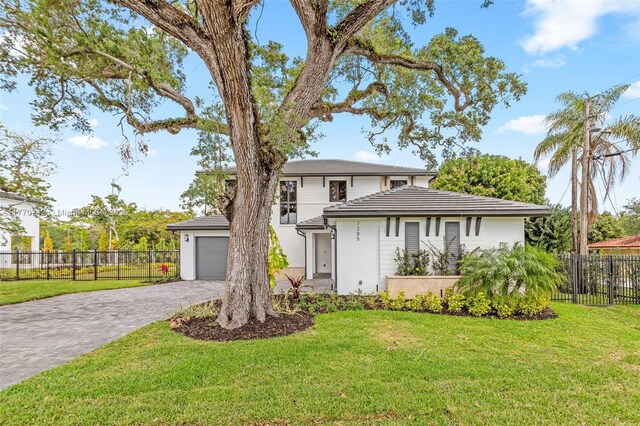 7285 SW 72nd Ter, Miami, FL 33143 - view of front of house featuring decorative driveway and stucco siding