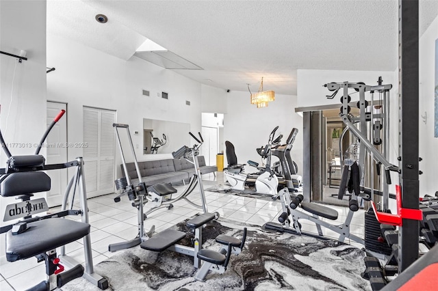 gym with a textured ceiling