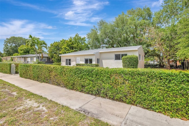 2331 NW 92nd St, Miami, FL 33147 - single story home featuring stucco siding