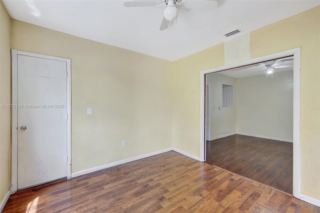 2331 NW 92nd St, Miami, FL 33147 - empty room featuring baseboards, visible vents, a ceiling fan, and wood finished floors
