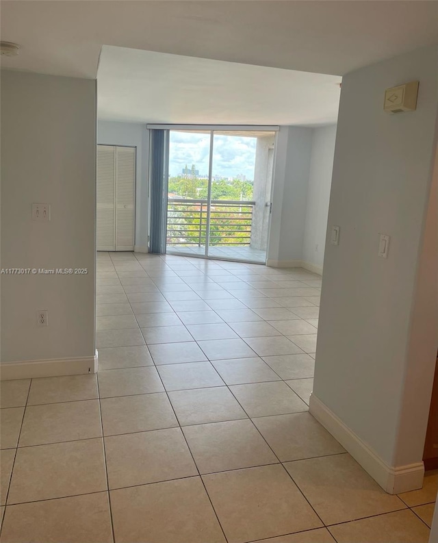 2400 SW 3rd Ave Unit 605, Miami, FL 33129 - unfurnished room with light tile patterned flooring and baseboards
