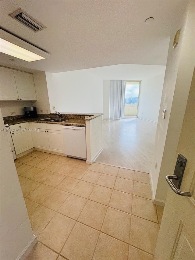 19501 W Country Club Dr Unit 1006, Aventura, FL 33180 - kitchen featuring open floor plan, a textured ceiling, a sink, visible vents, and white dishwasher