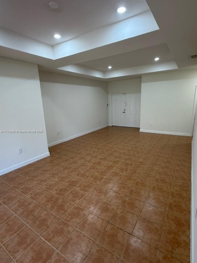 finished below grade area with baseboards and recessed lighting