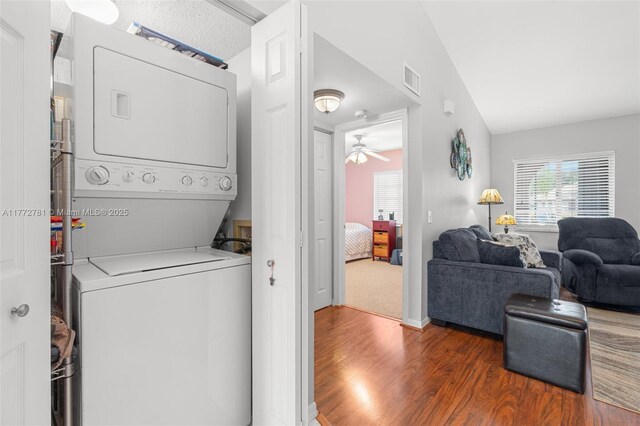 3171 Holiday Springs Blvd Unit 31-5, Margate, FL 33063 - laundry room with wood finished floors, stacked washer and clothes dryer, laundry area, visible vents, and ceiling fan