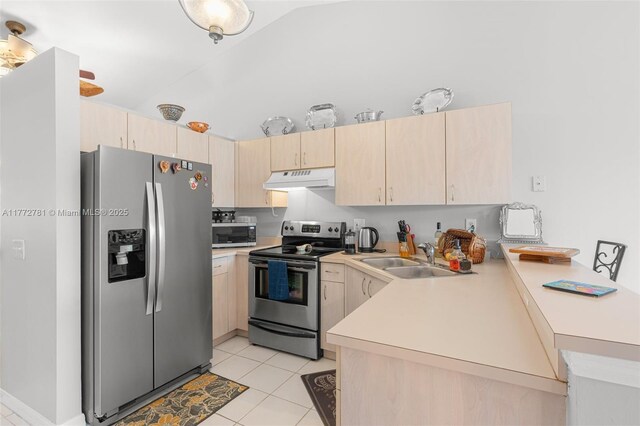 3171 Holiday Springs Blvd Unit 31-5, Margate, FL 33063 - kitchen featuring a sink, appliances with stainless steel finishes, a peninsula, under cabinet range hood, and light brown cabinets
