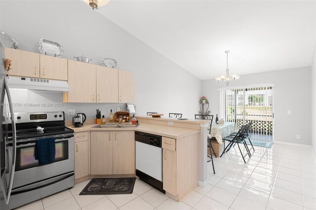 3171 Holiday Springs Blvd Unit 31-5, Margate, FL 33063 - kitchen with light brown cabinets, under cabinet range hood, electric stove, and dishwasher