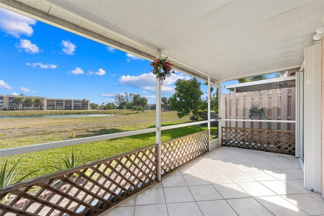3171 Holiday Springs Blvd Unit 31-5, Margate, FL 33063 - view of patio with a water view
