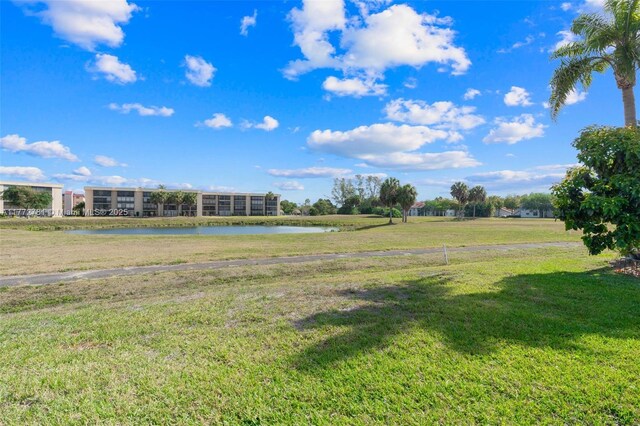 3171 Holiday Springs Blvd Unit 31-5, Margate, FL 33063 - view of yard with a water view