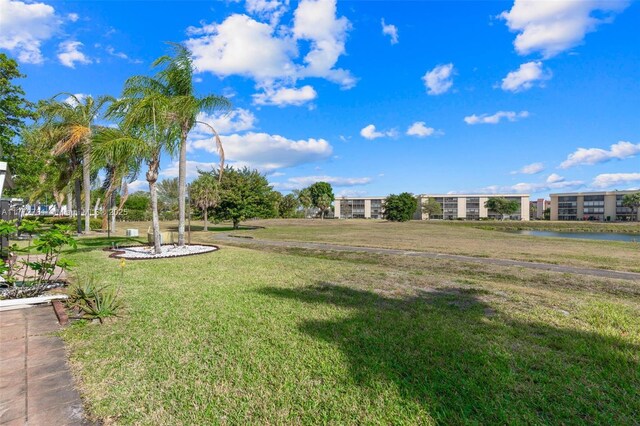 3171 Holiday Springs Blvd Unit 31-5, Margate, FL 33063 - view of yard featuring a water view