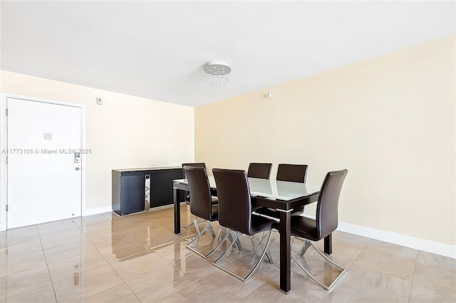 1849 S Ocean Dr Unit 711, Hallandale Beach, FL 33009 - dining room with light tile patterned floors and baseboards