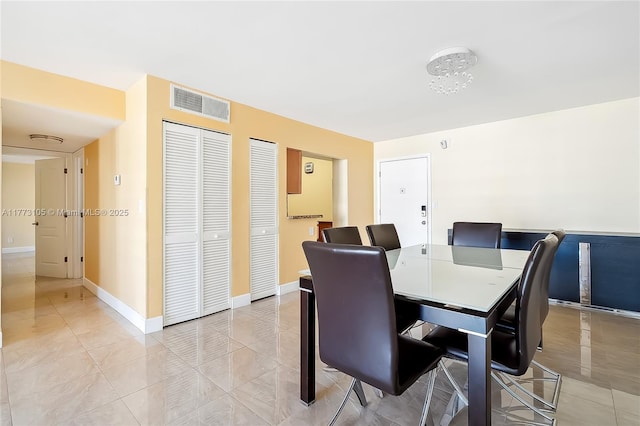 1849 S Ocean Dr Unit 711, Hallandale Beach, FL 33009 - dining space with baseboards