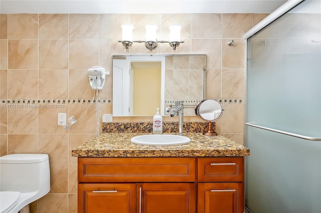 1849 S Ocean Dr Unit 711, Hallandale Beach, FL 33009 - full bath featuring tile walls, vanity, a shower stall, toilet, and backsplash