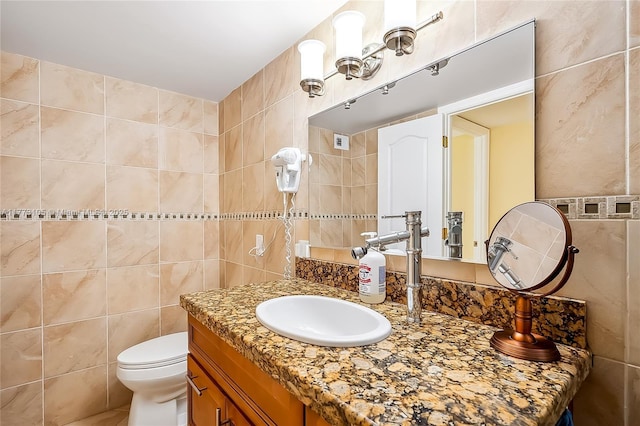 1849 S Ocean Dr Unit 711, Hallandale Beach, FL 33009 - bathroom with tile walls, vanity, and toilet