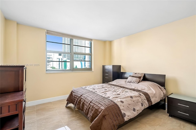 1849 S Ocean Dr Unit 711, Hallandale Beach, FL 33009 - bedroom featuring baseboards and light tile patterned floors
