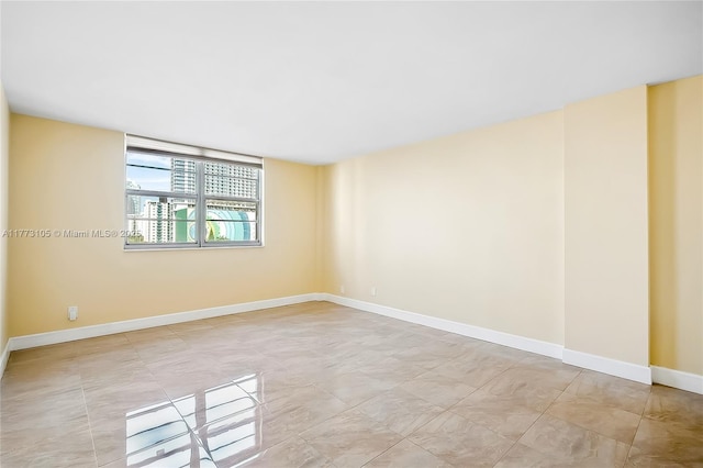 1849 S Ocean Dr Unit 711, Hallandale Beach, FL 33009 - spare room with baseboards
