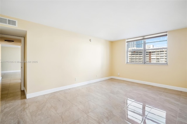 1849 S Ocean Dr Unit 711, Hallandale Beach, FL 33009 - spare room featuring baseboards