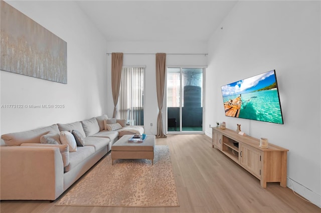 244 Biscayne Blvd Unit 206, Miami, FL 33132 - living area with light wood-style floors