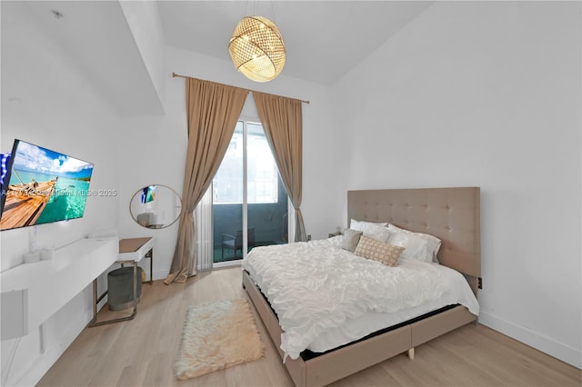 244 Biscayne Blvd Unit 206, Miami, FL 33132 - bedroom with wood finished floors and baseboards