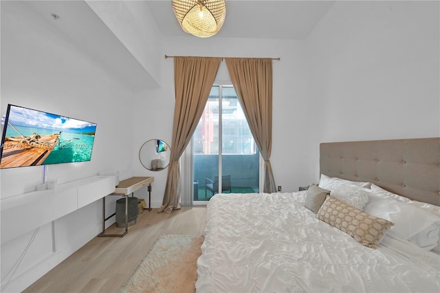 244 Biscayne Blvd Unit 206, Miami, FL 33132 - bedroom with access to exterior and wood finished floors