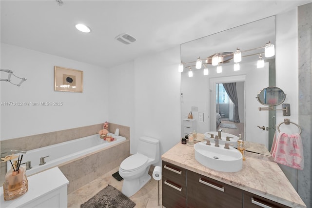 244 Biscayne Blvd Unit 206, Miami, FL 33132 - ensuite bathroom featuring a bath, vanity, and toilet