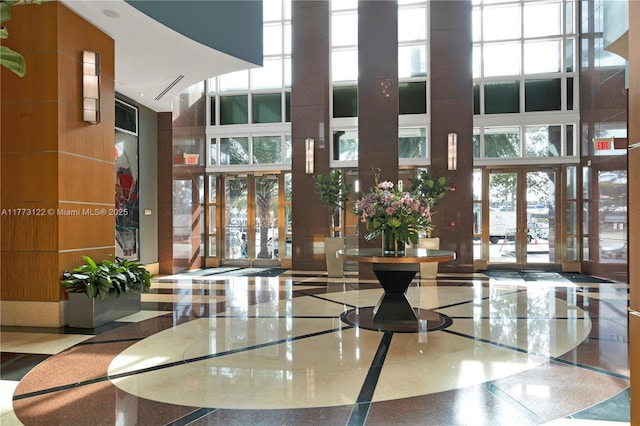 244 Biscayne Blvd Unit 206, Miami, FL 33132 - building lobby featuring a high ceiling