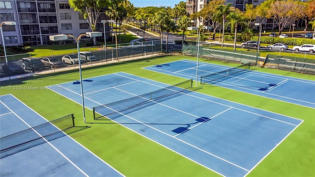 1100 Colony Point Cir Unit 201, Pembroke Pines, FL 33026 - view of tennis court with fence