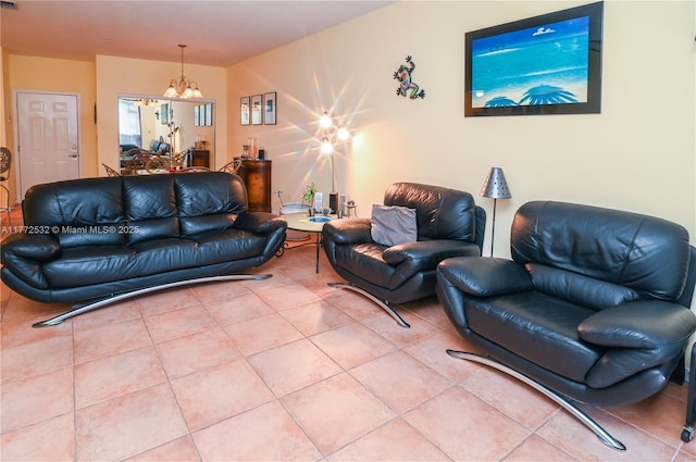 85 Gulfstream Rd Unit 304A, Dania Beach, FL 33004 - living room featuring tile patterned flooring and a chandelier