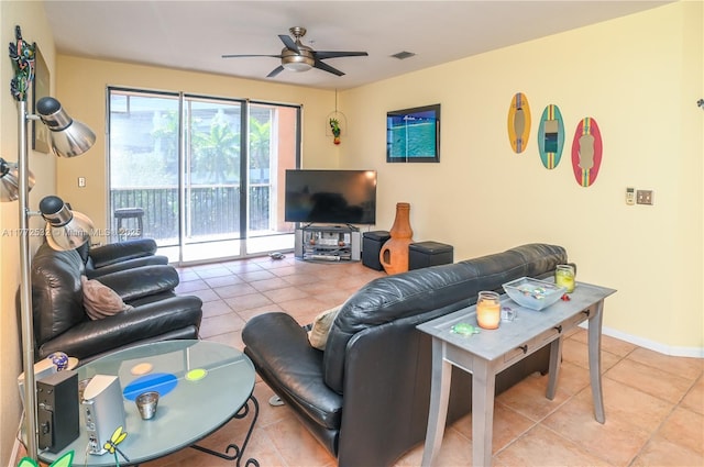 85 Gulfstream Rd Unit 304A, Dania Beach, FL 33004 - living area with ceiling fan, tile patterned flooring, and baseboards