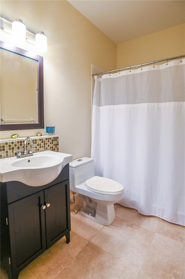 85 Gulfstream Rd Unit 304A, Dania Beach, FL 33004 - full bath with toilet, vanity, backsplash, and tile patterned floors