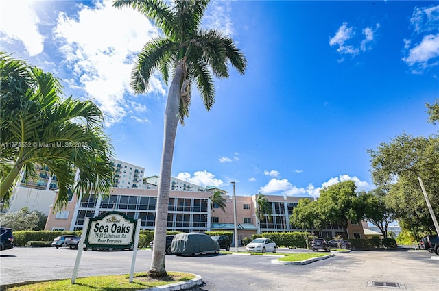 85 Gulfstream Rd Unit 304A, Dania Beach, FL 33004 - view of building exterior with uncovered parking