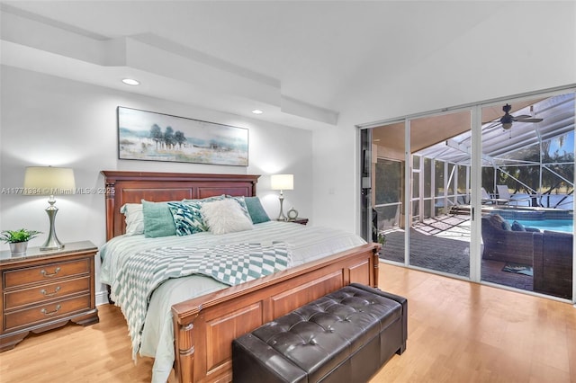 bedroom featuring lofted ceiling, access to outside, light wood finished floors, and recessed lighting