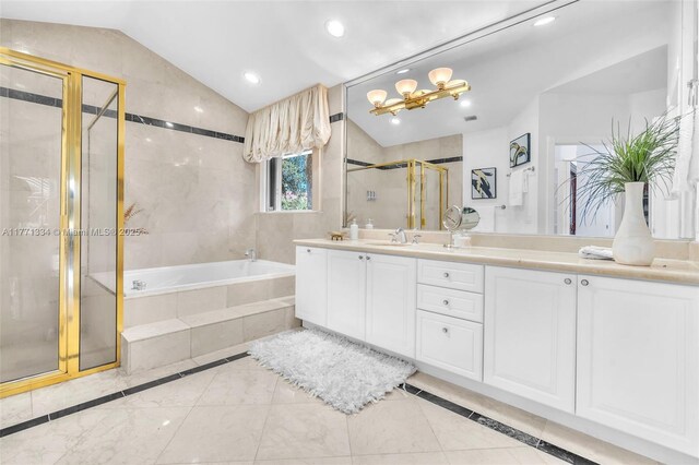 full bathroom featuring a stall shower, vanity, lofted ceiling, a bath, and recessed lighting