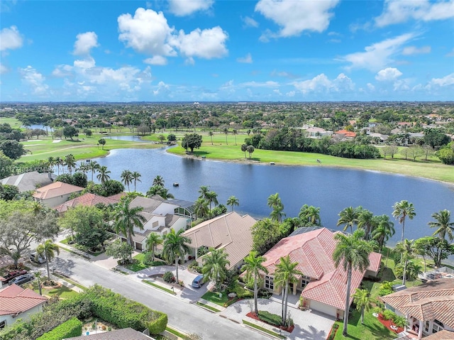 drone / aerial view featuring a residential view and a water view