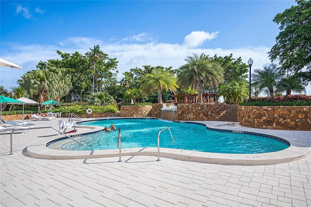 pool featuring a patio area