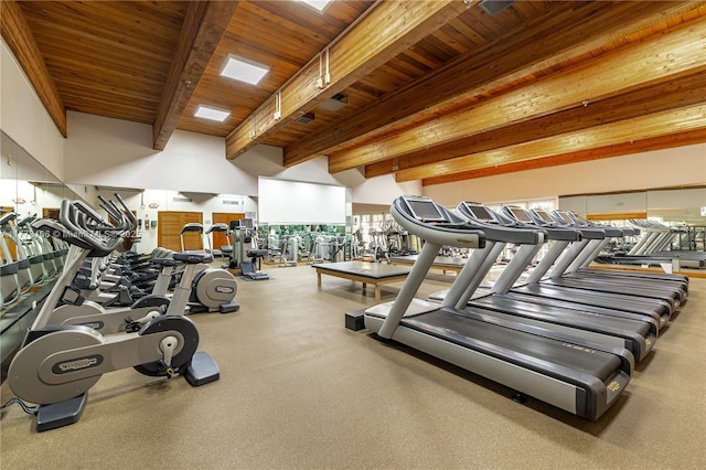 exercise room with wood ceiling and plenty of natural light