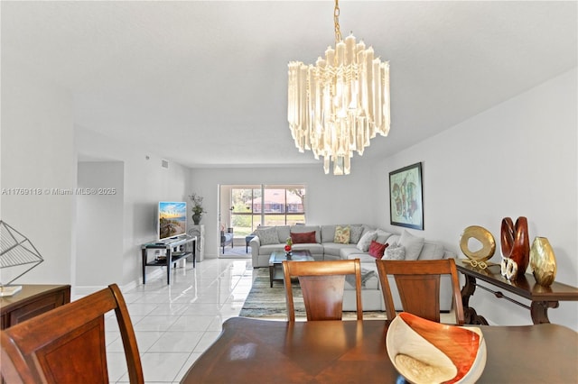 5876 Regal Glen Dr Unit 101, Boynton Beach, FL 33437 - dining room with baseboards, an inviting chandelier, and light tile patterned floors