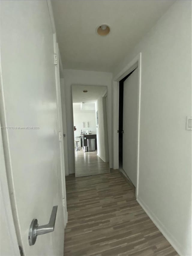55 SE 6th St Unit 1506, Miami, FL 33131 - hall with dark wood-style flooring