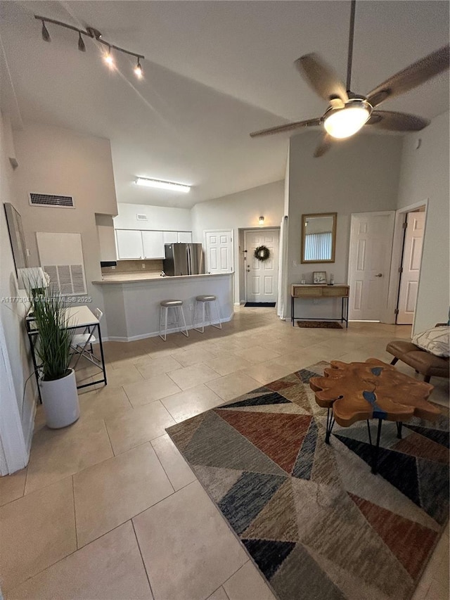 2445 SW 18th Ter Unit 1119, Fort Lauderdale, FL 33315 - bedroom with ceiling fan, light tile patterned floors, and baseboards