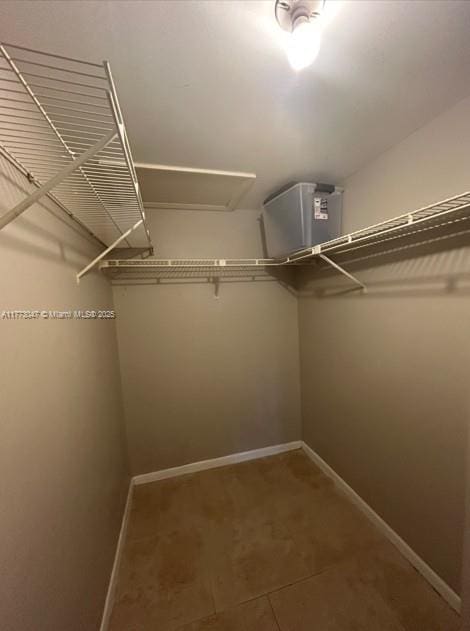 2445 SW 18th Ter Unit 1119, Fort Lauderdale, FL 33315 - walk in closet with tile patterned floors