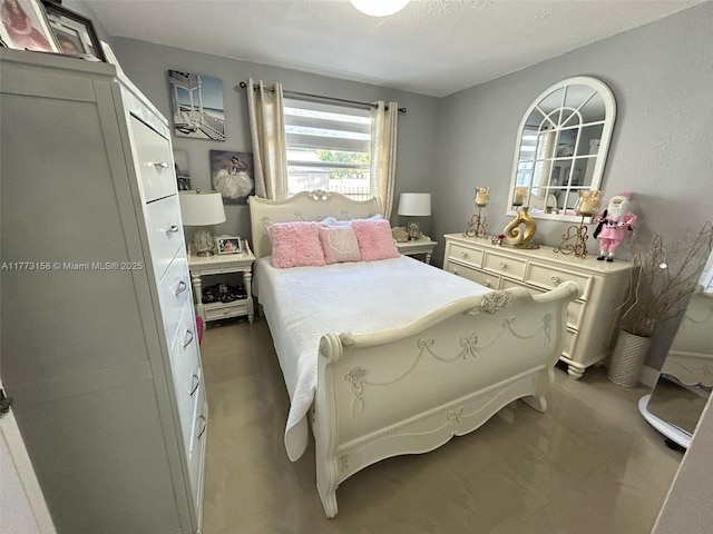 1941 NW 113th Ter, Miami, FL 33167 - bedroom featuring a textured ceiling