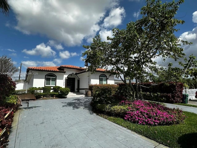 11845 SW 3rd St, Miami, FL 33184 - mediterranean / spanish-style house featuring a tile roof and stucco siding