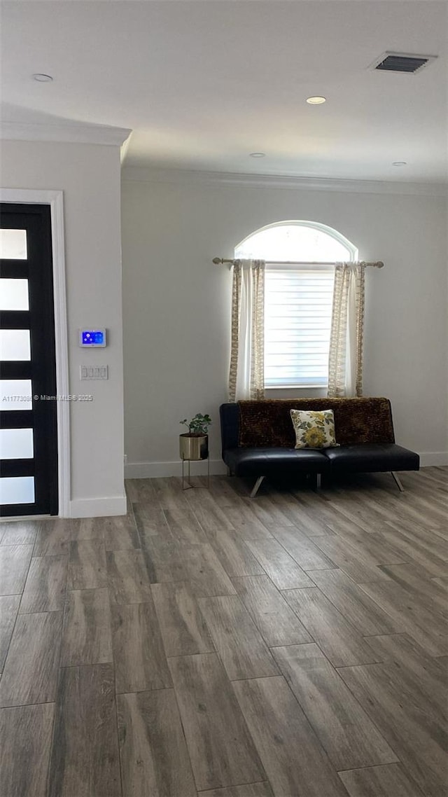 11845 SW 3rd St, Miami, FL 33184 - unfurnished room featuring visible vents, ornamental molding, baseboards, and wood finished floors